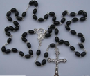Wooden black rosary with oval shaped beads